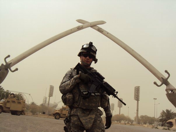 Tyler at the Arc of Triumph (also known as the Cross Sabres) in Baghdad, Iraq in 2010.