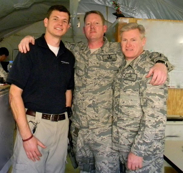 Adam with two of his former senior leaders in Afghanistan.