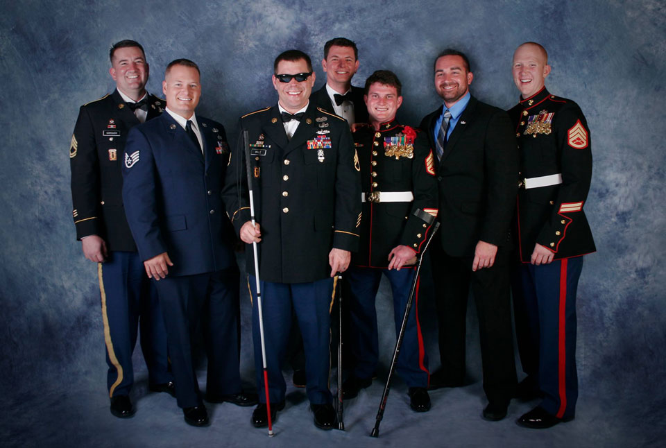 Adam with several combat wounded friends at the annual EOD Memorial and Ball.