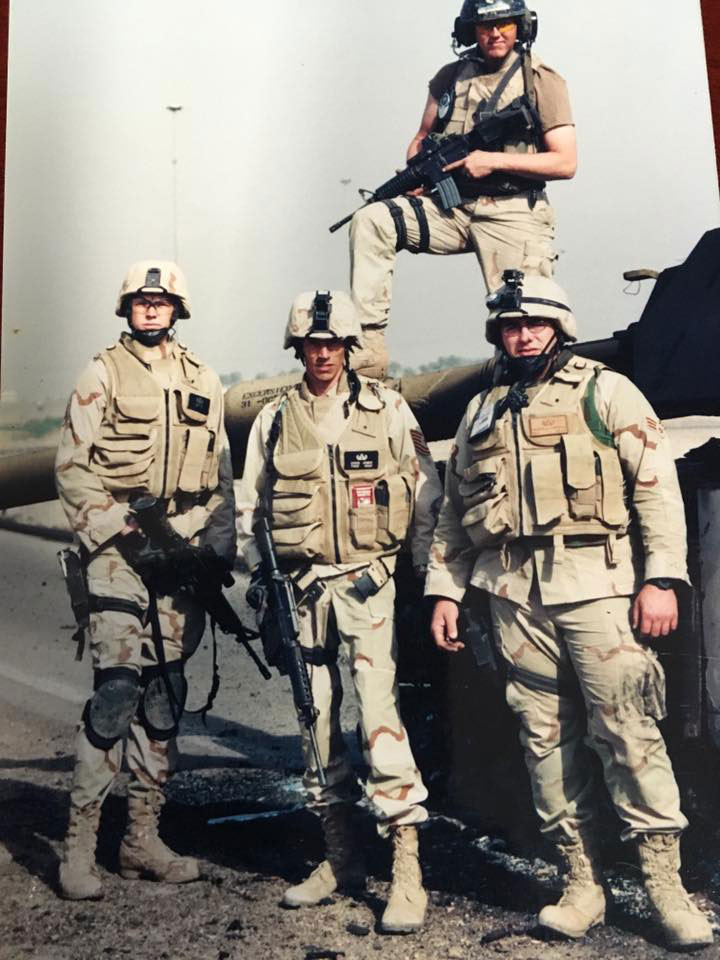 Adam in Baghdad with his EOD Team and their security.