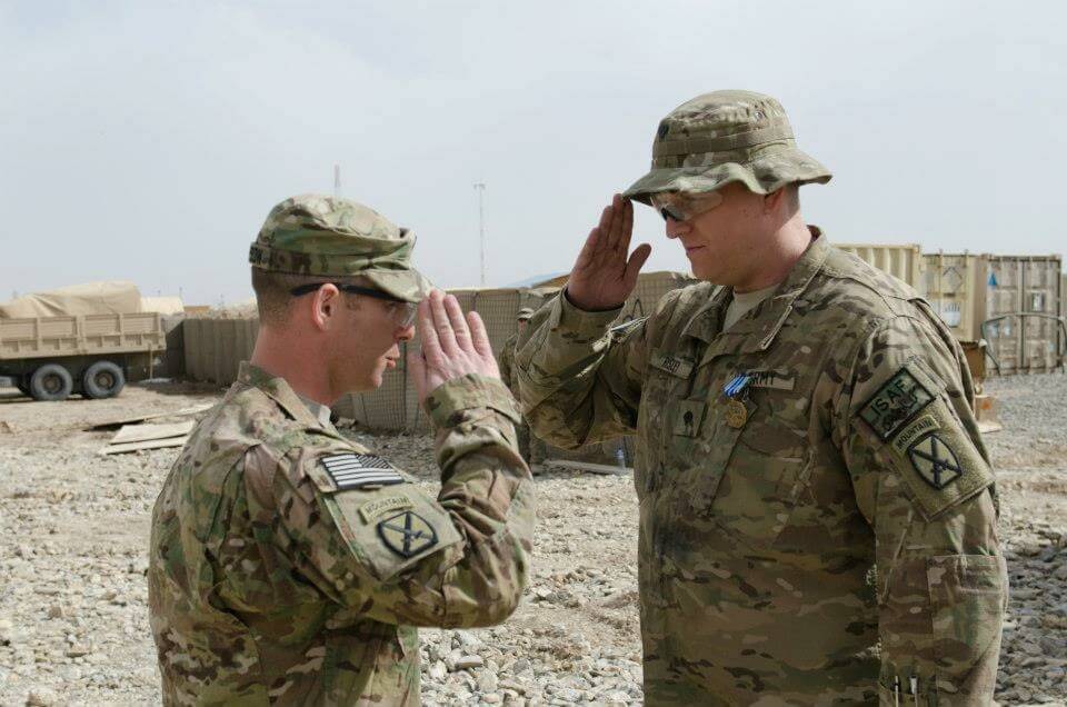 Saluting his commanding officer after receiving the AAM during deployment