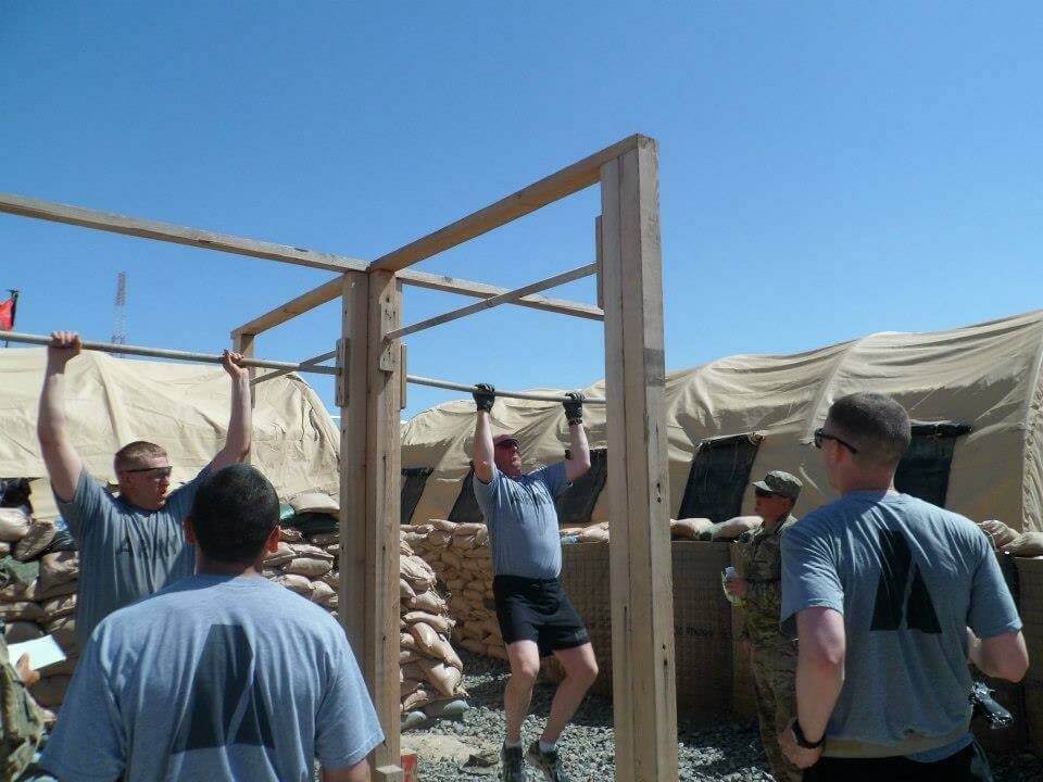 Knocking out some pull-ups for a contest during deployment.