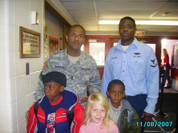 Military appreciation day at his daughter's school.