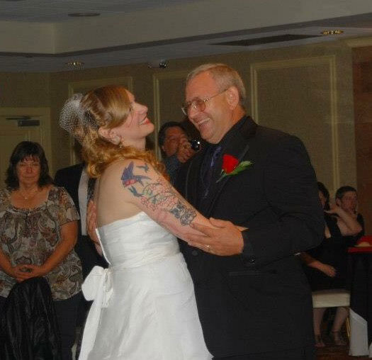 The father daughter dance at Ashley’s wedding.