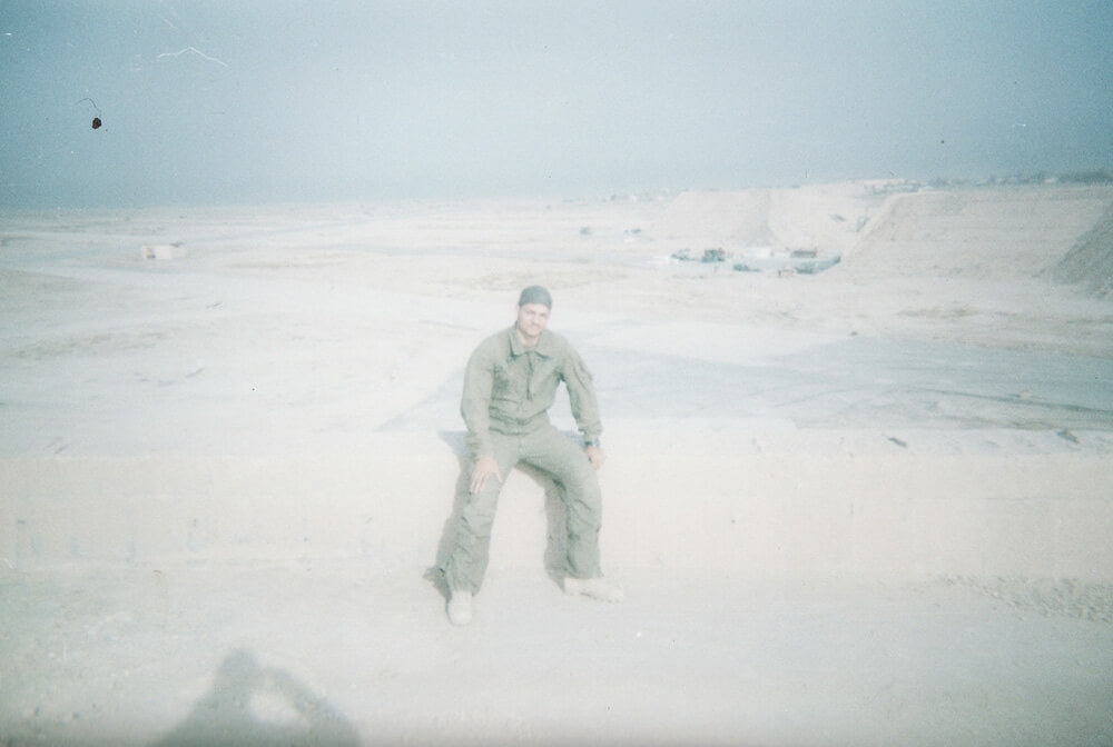 Keith sitting on top of an aircraft bunker at Talil Air Force Base near An Nasiriyah,Iraq