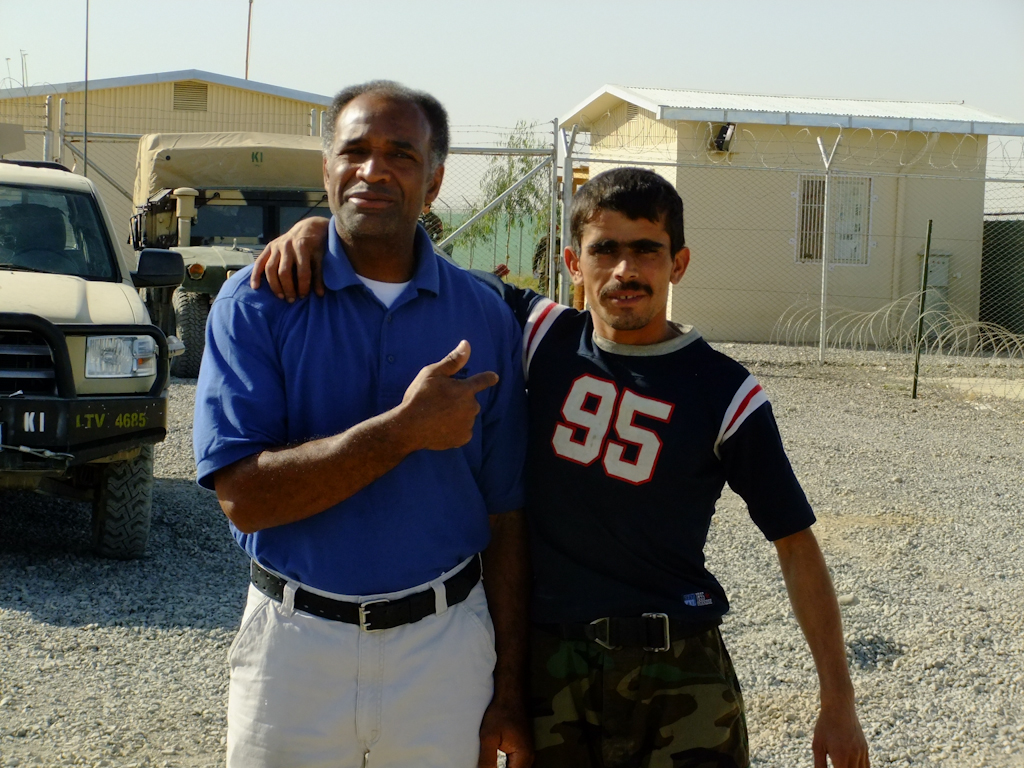 Anthony training his Afghan Motor Sergeant on personnel and professional tactic of survival for his team, 2011