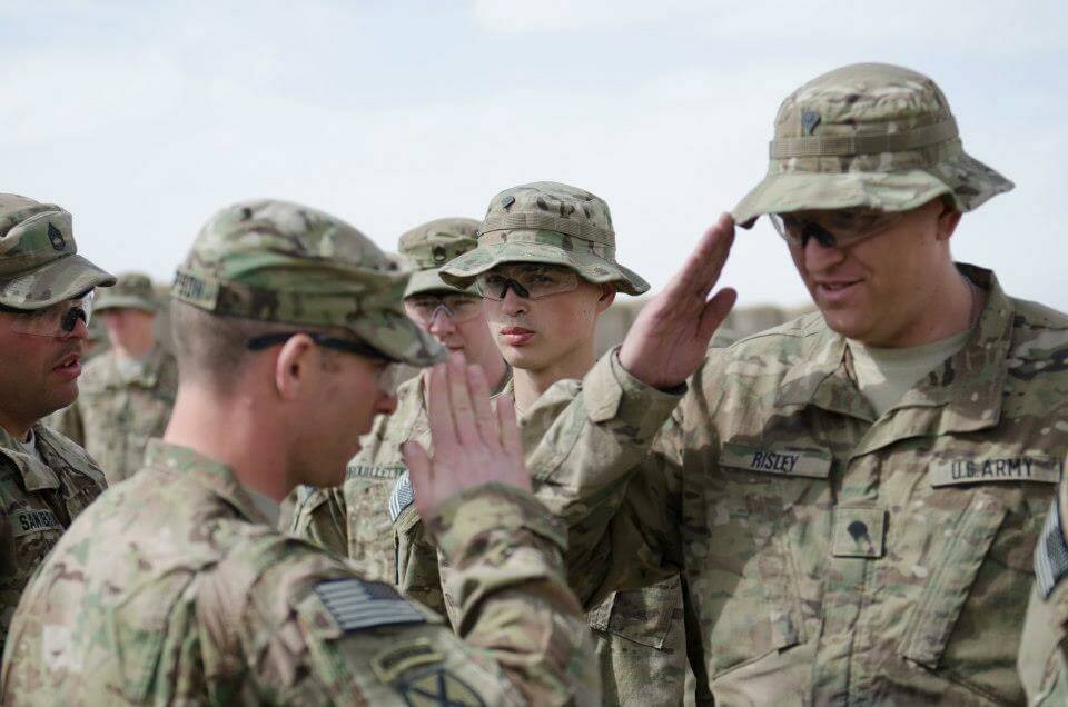 Receiving their combat patches for deployment