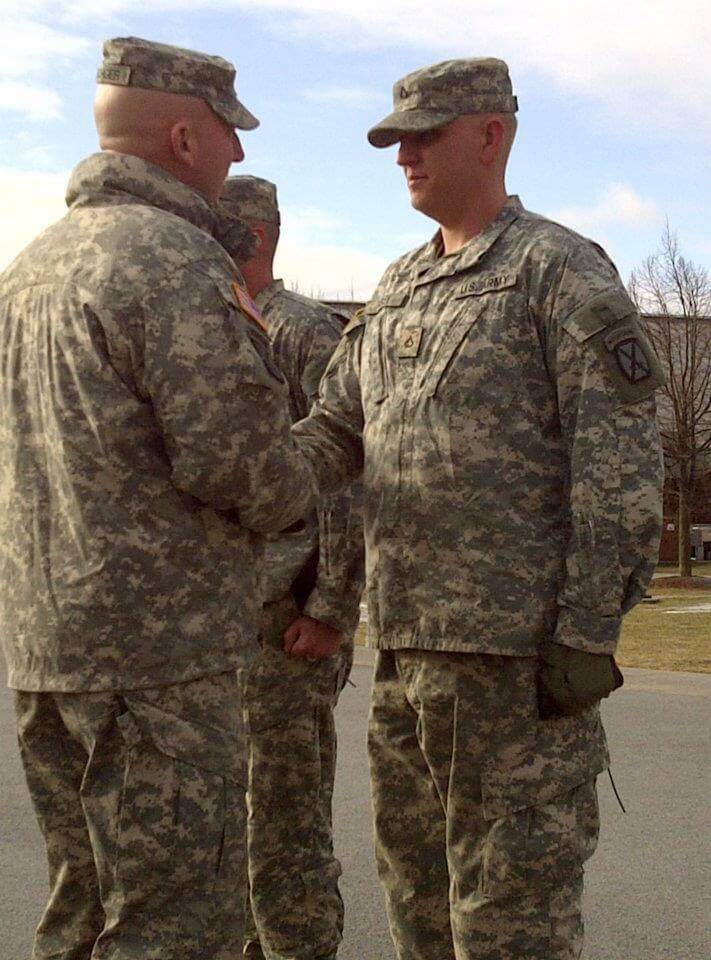 Receiving an AAM from his batallion commander