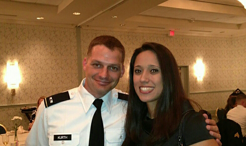 Keith with his wife at the reception of his heroic little brother’s service in January 2013