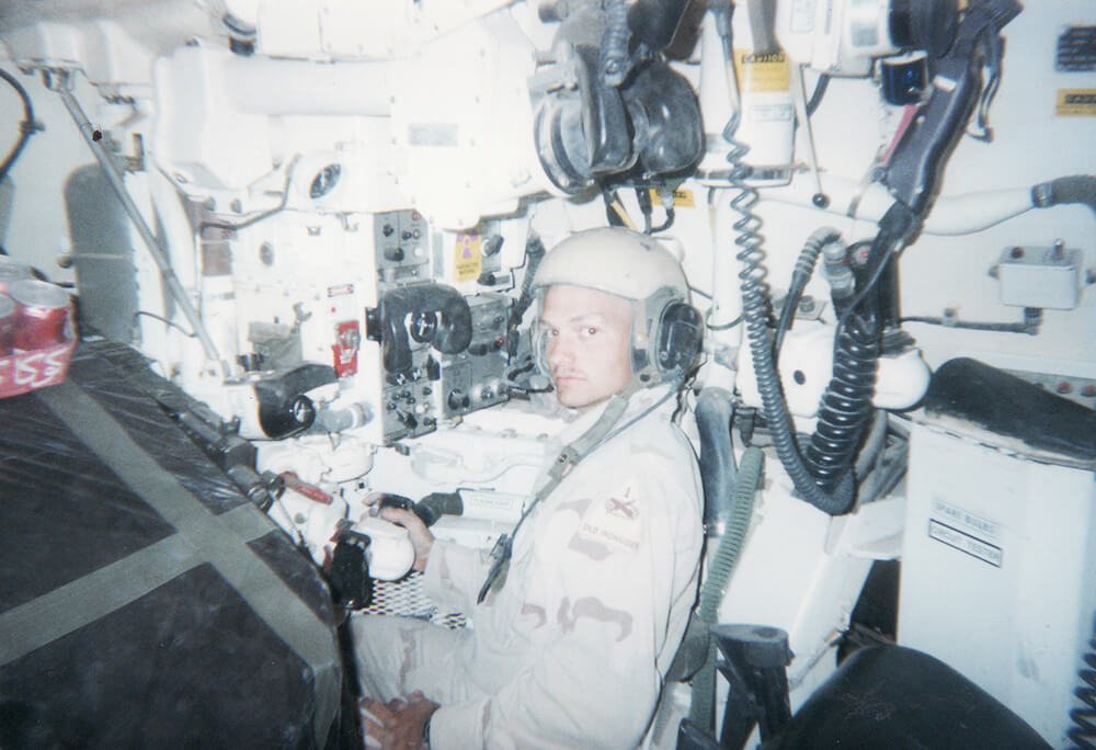 Keith in the gunners seat of his tank in Kuwait