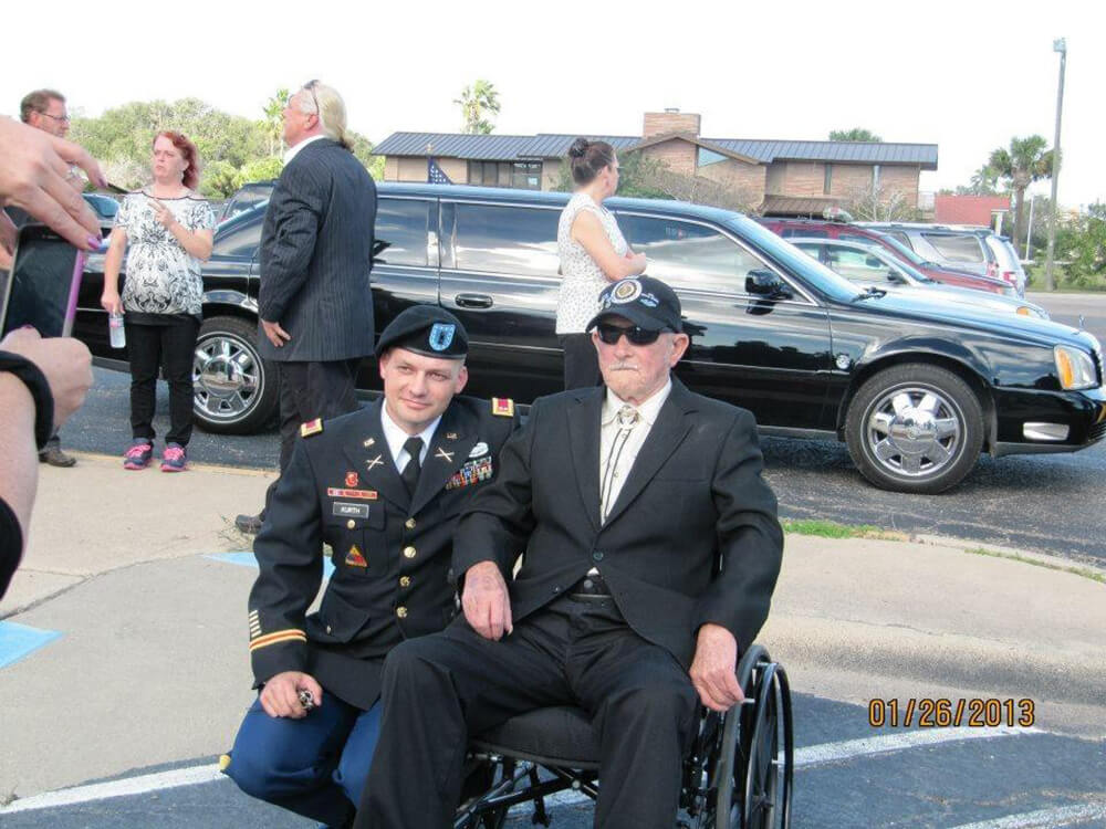 Keith with his grandfather Corporal Carl Kurth (Korean War Vet and 2 time Purple Heart recipient) at his little brother’s service prior to the eulogy