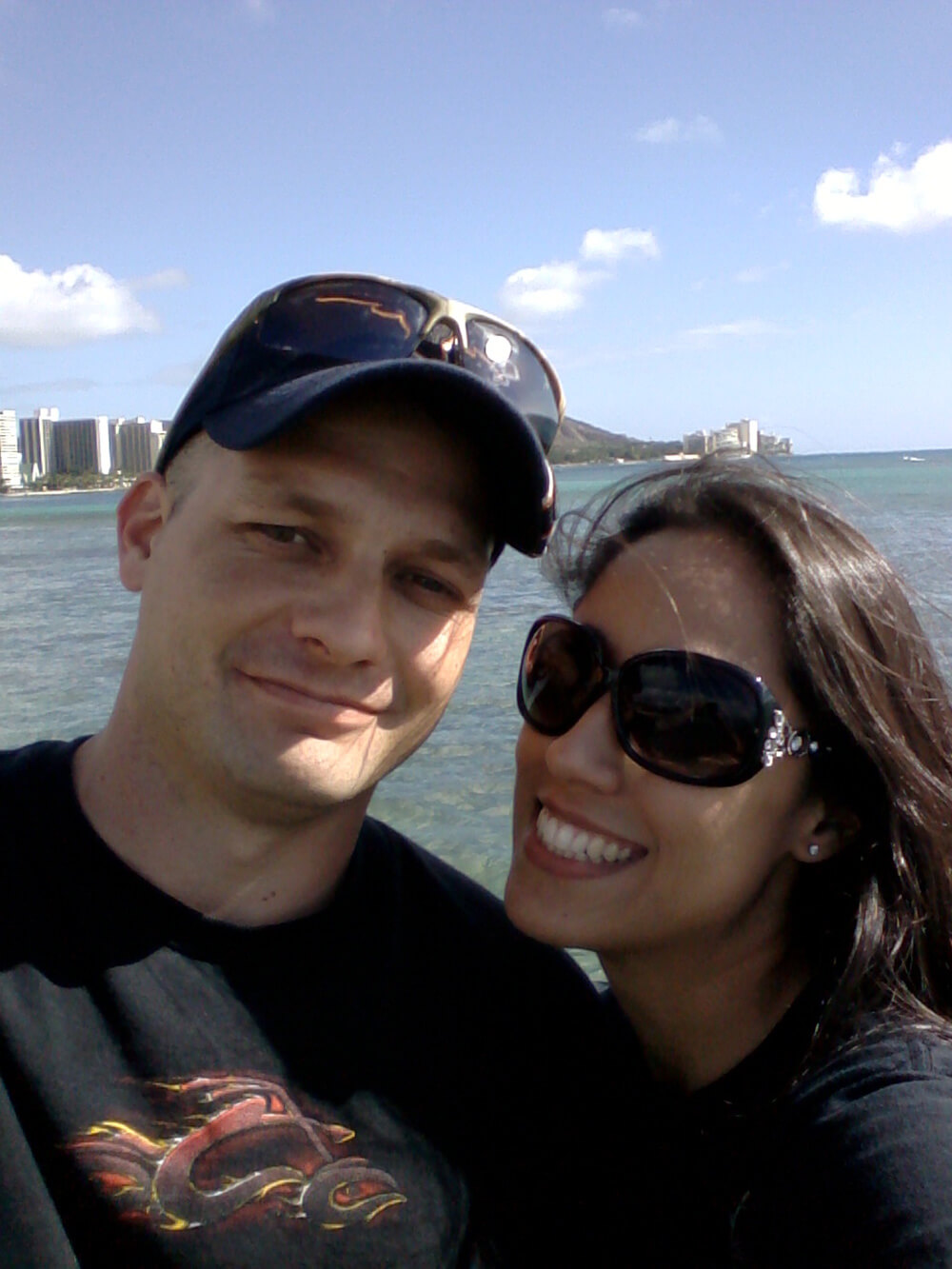 With his wife on their first trip to Waikiki posing in front of Diamond Head crater