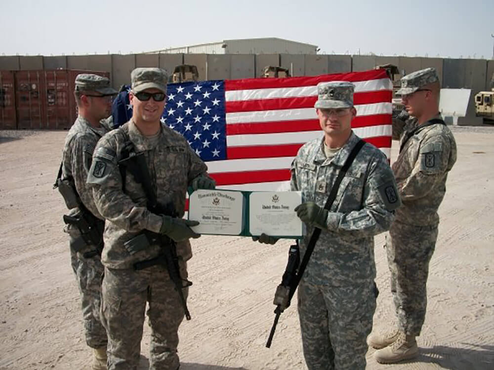 Keith with 2LT Cooper Bradley at his re-enlistment ceremony at Area 51, Al Shaibah, Iraq