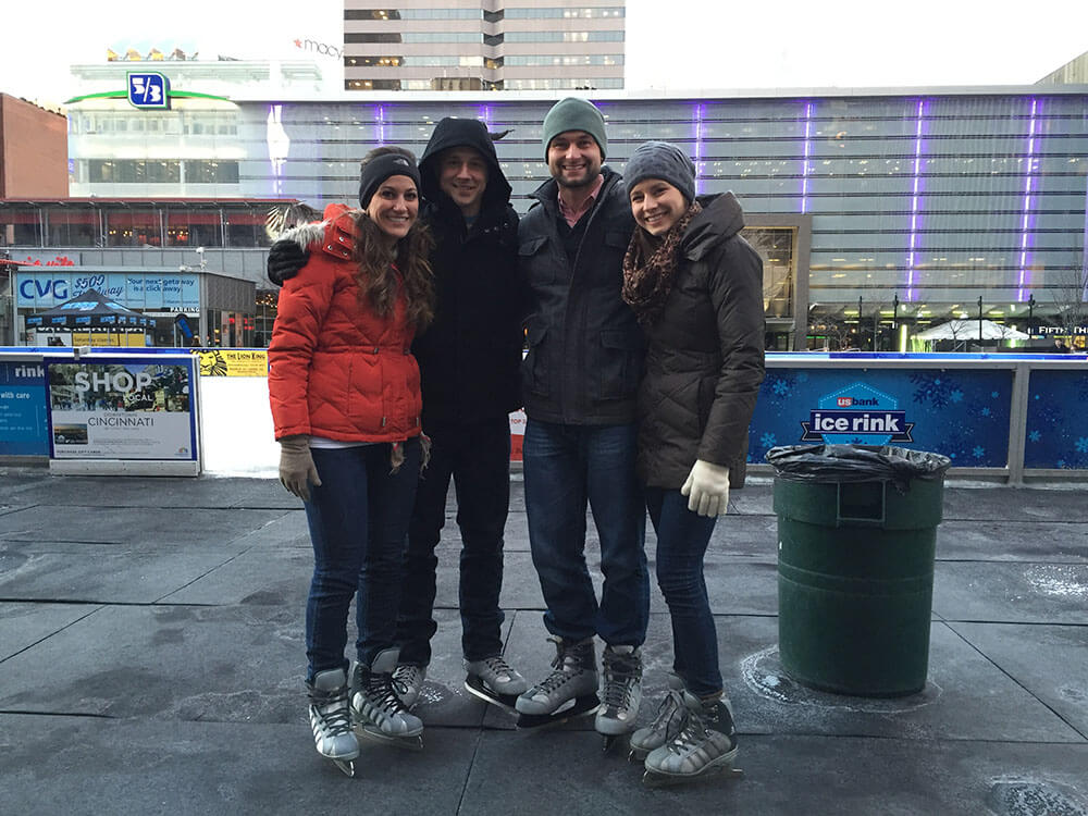 Mason with his wife and their friends at Fountain Square in Cincinnati