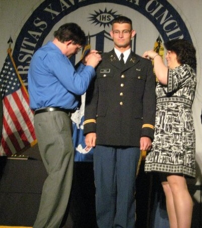 Mason with his parents Brian Rick and Mary Rick, day before college graduation