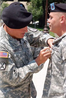 Pinning of Purple Heart and Bronze Star By General Tooley