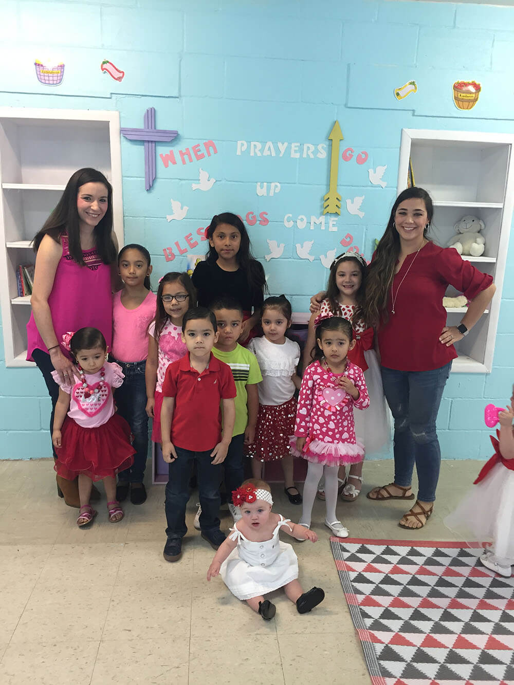 Posing with her Sunday School children and assistant Sunday School teacher